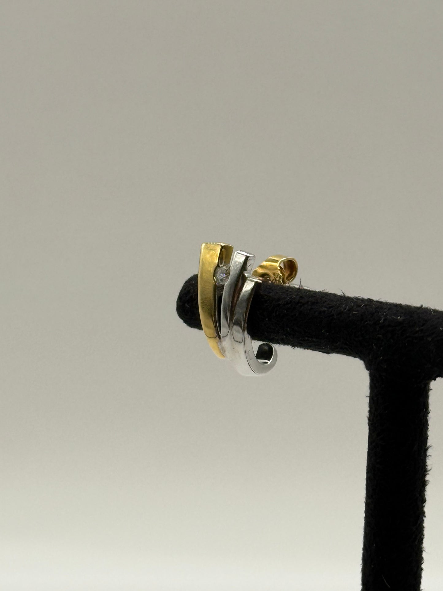 Boucles d’oreilles en or jaune et or blanc serties de diamants