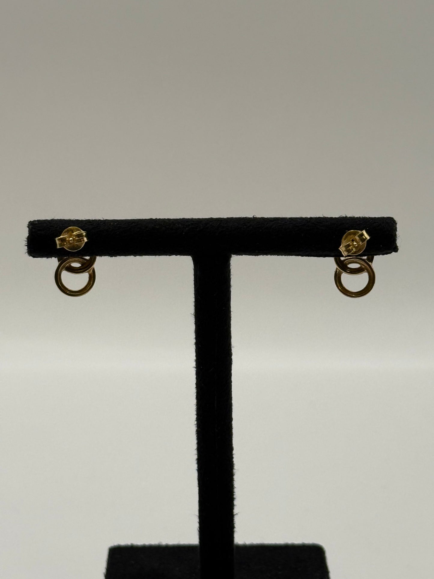 Boucles d’oreilles entrelacées or & diamants