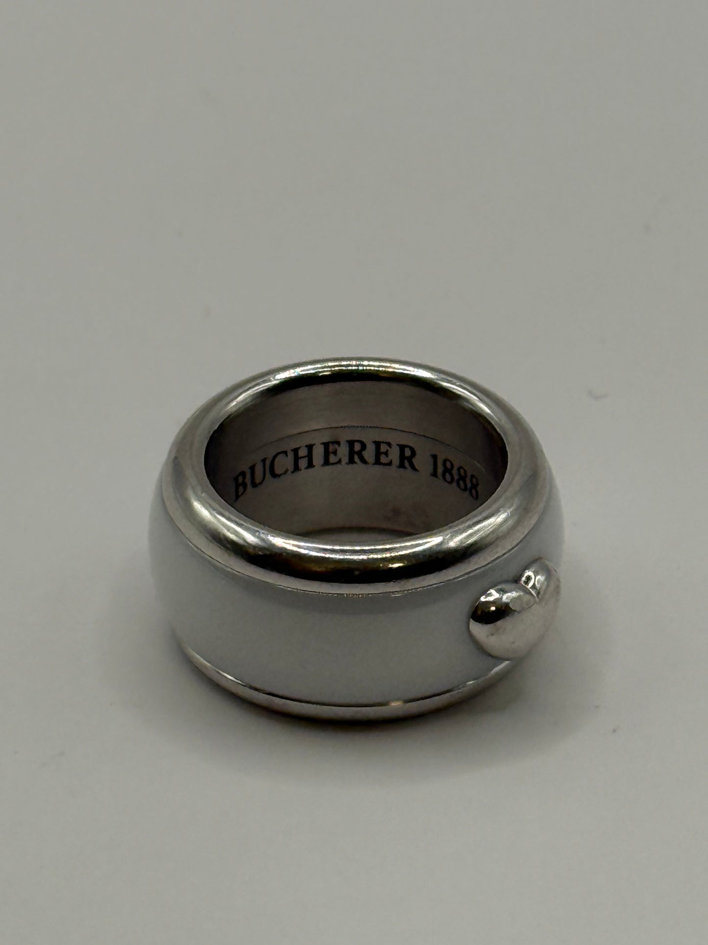 Bague Bucherer Vario – Or blanc 18k + 3 anneaux interchangeables (céramique, bois, acier émaillé)