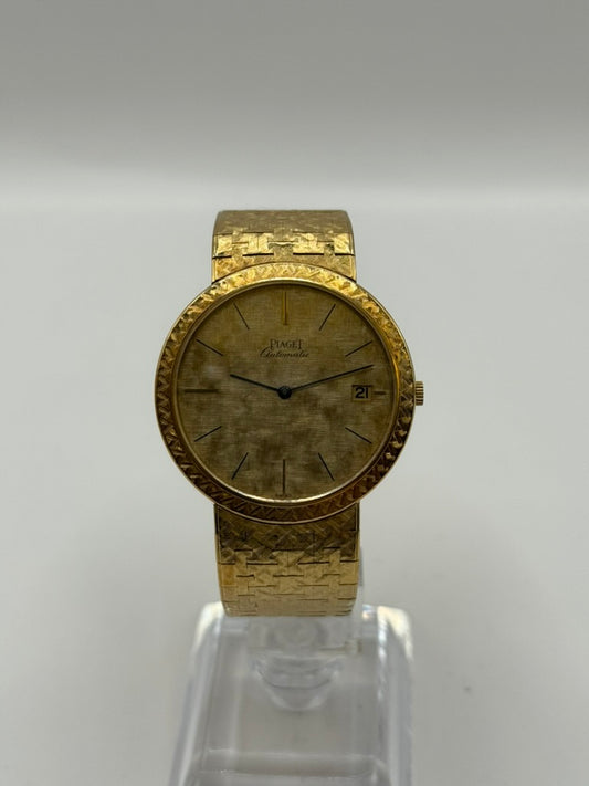 Piaget 13101 A3 – Montre automatique en or jaune, cadran texturé