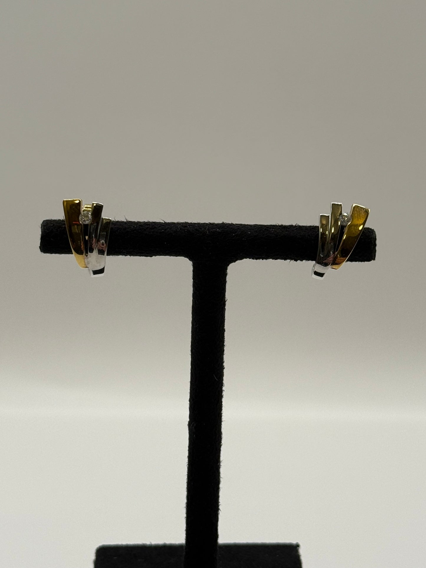 Boucles d’oreilles en or jaune et or blanc serties de diamants