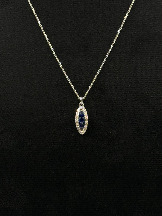 Collier en or blanc serti de saphirs et de diamants