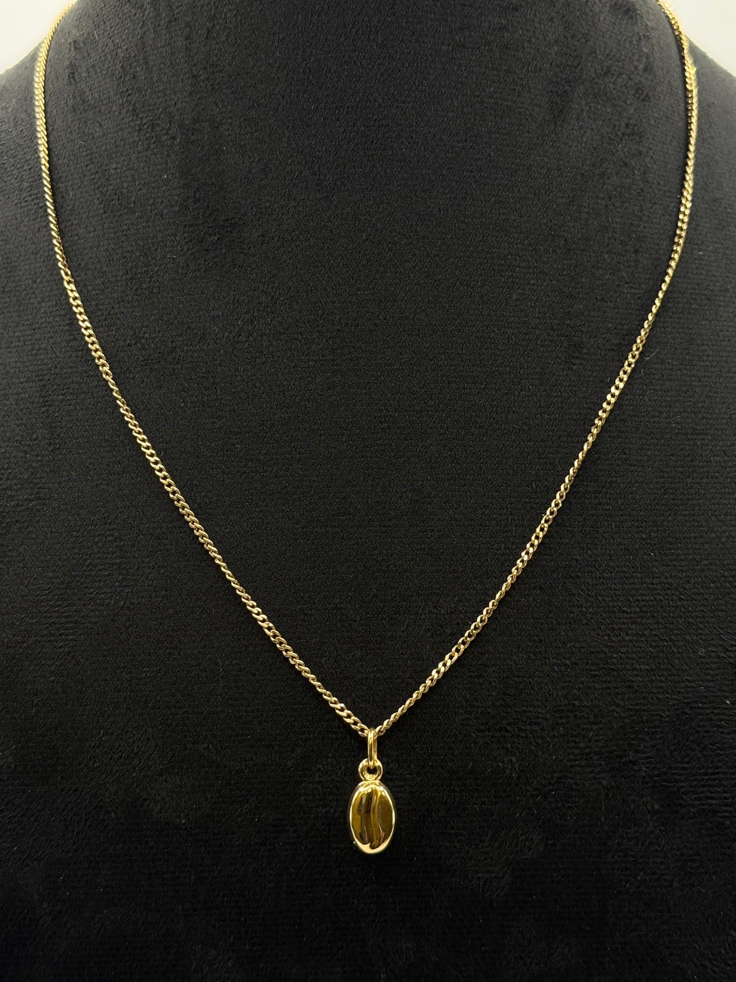 Collier en or jaune avec pendentif graine de café