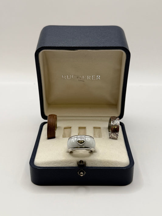 Bague Bucherer Vario – Or blanc 18k + 3 anneaux interchangeables (céramique, bois, acier émaillé)