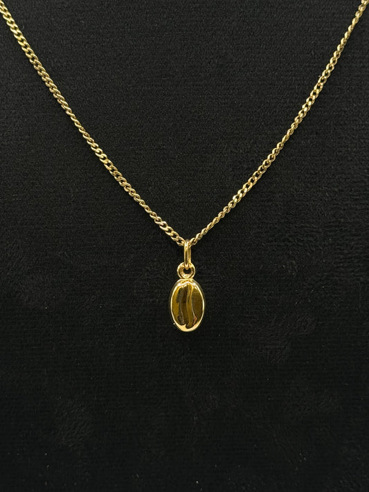 Collier en or jaune avec pendentif graine de café bijou de luxe