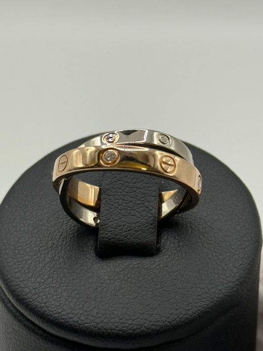Bague Cartier Love entrelacée en or rose et or blanc sertie de diamants taille 54 bijou de luxe