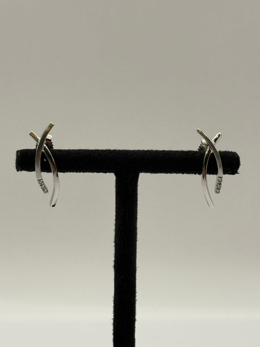 Boucles d’oreilles en or blanc serties de diamants bijou de luxe