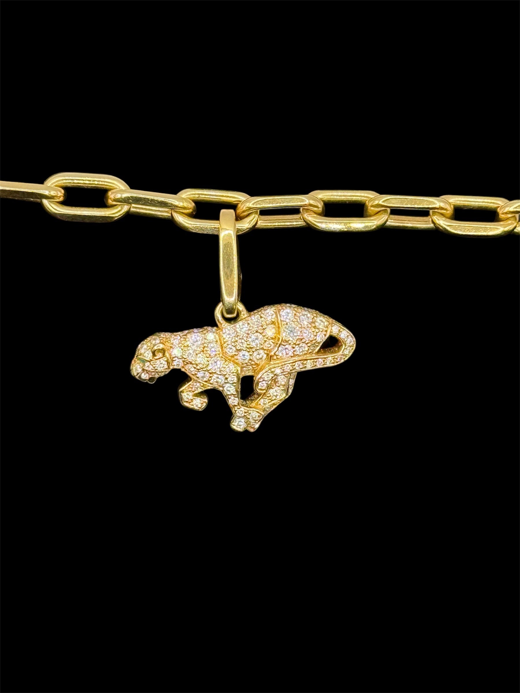 Bracelet Cartier à breloques en or jaune et diamants taille 18 bijou de luxe vue 3
